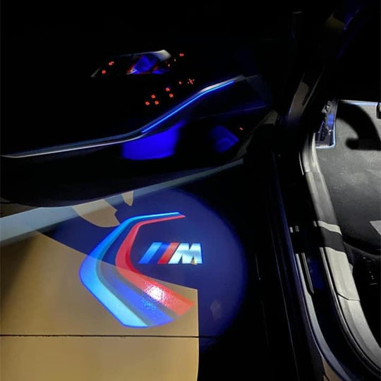 M Race Track Door Projector